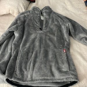 Grey fuzzy north face pull over